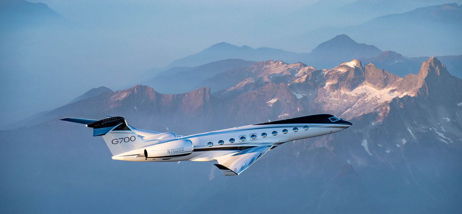 Gulfstream G700 flying over mountains